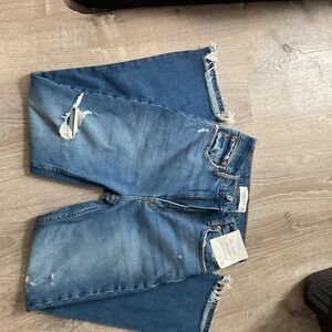 Distressed Blue Denim Jeans